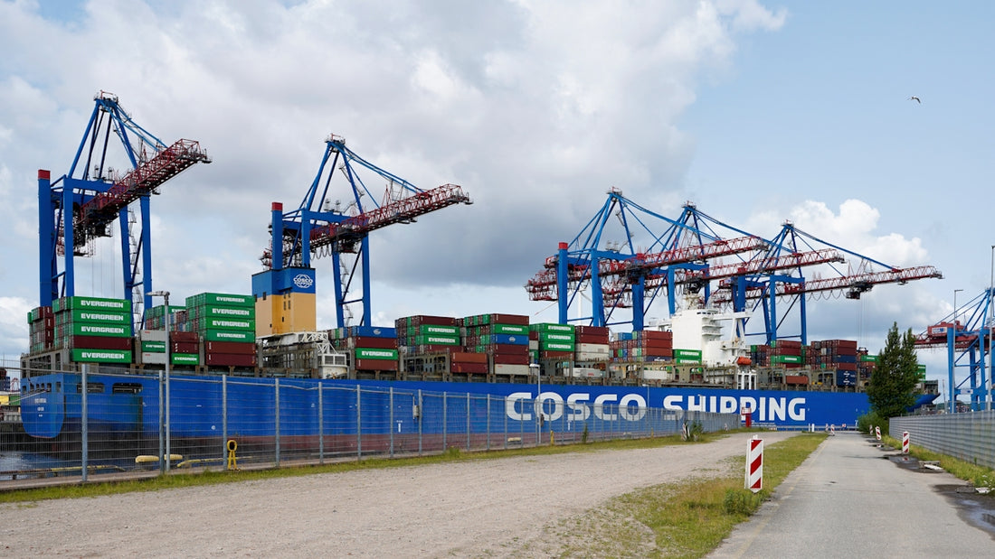 Container ship docked at a port with cranes